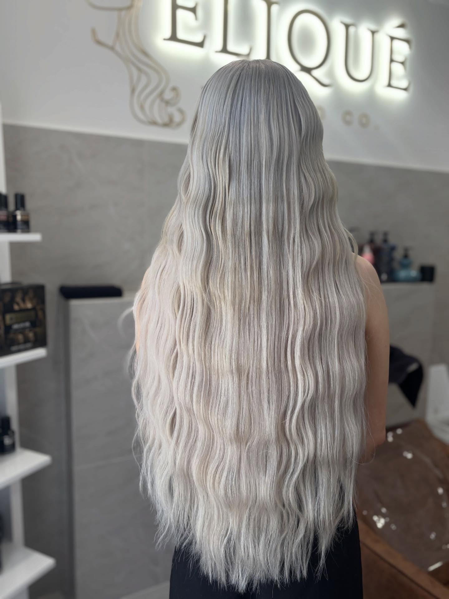 Icy blonde long waves with high shine
