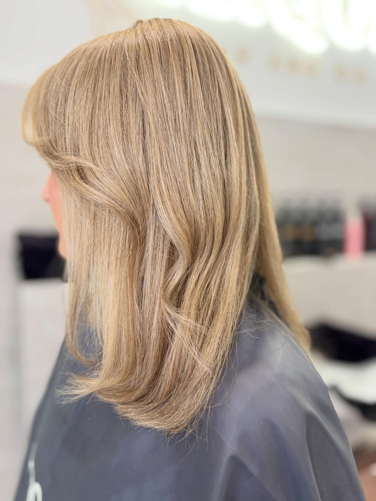 Soft layered blonde cut with movement